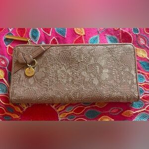 Luscious Lanvin tan lace wallet. Approximately 7 x 4“. New without tags.